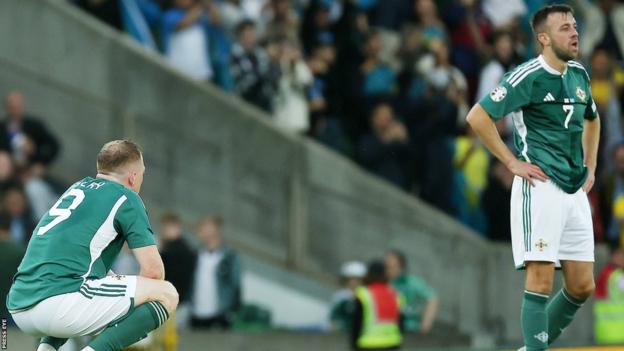 Shayne Lavery and Conor McMenamin show their disappointment at the final whistle