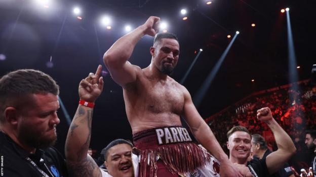 Joseph Parker is lifted onto the shoulders of his team